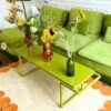 Modern Green Sofa Set with Decorative Flower Vases - Image 2